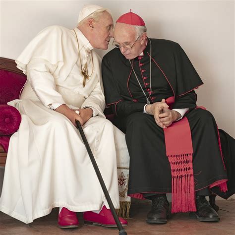 why do popes wear red shoes